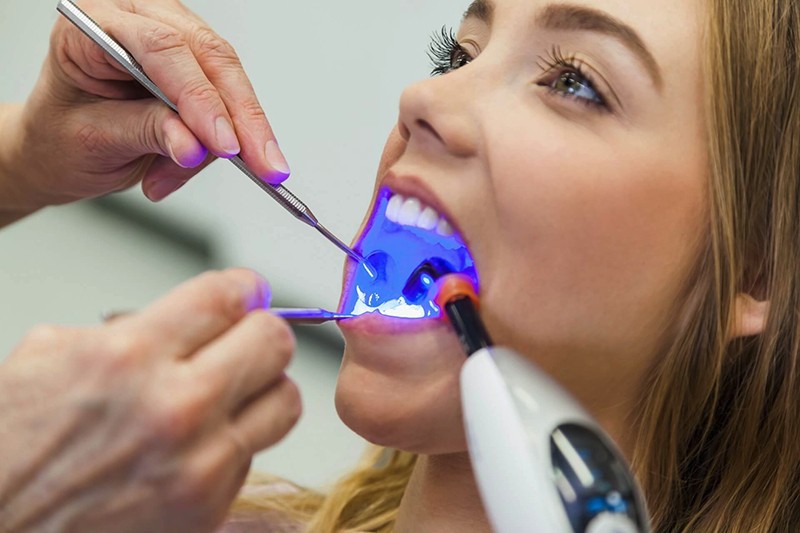 girl getting dental filling